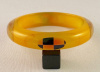 SZ46 Shultz citron bakelite bangle with checker dots